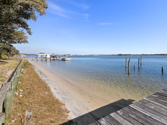 view of dock with a water view