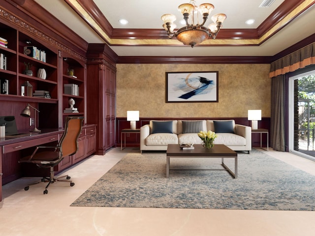 office space with visible vents, a notable chandelier, ornamental molding, built in desk, and a raised ceiling