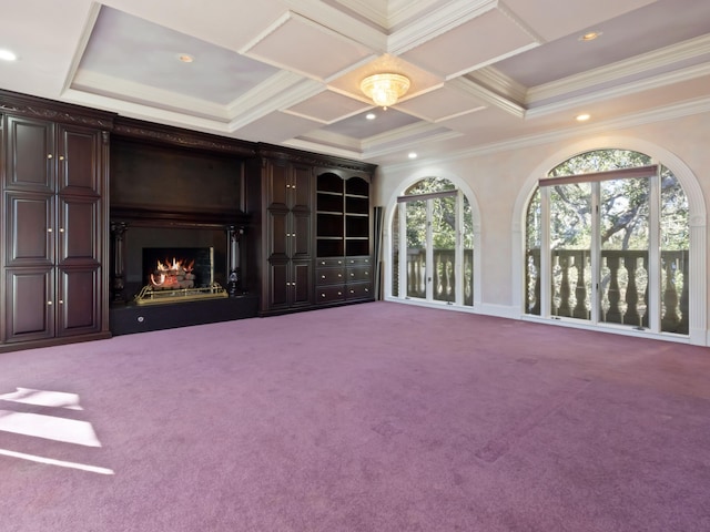 unfurnished living room featuring crown molding, a large fireplace, carpet, recessed lighting, and coffered ceiling