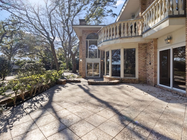 view of patio / terrace featuring a balcony