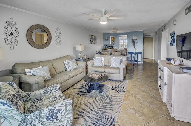 living room with light tile patterned flooring, a textured ceiling, crown molding, and ceiling fan