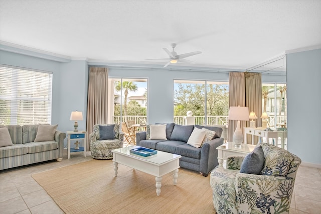 living room featuring a wealth of natural light, ornamental molding, and light tile patterned flooring