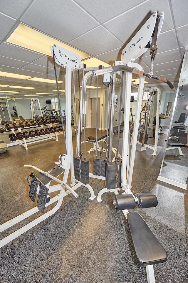 exercise room with a drop ceiling