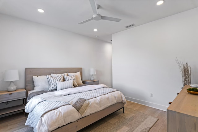 bedroom with visible vents, baseboards, ceiling fan, recessed lighting, and light wood-style floors