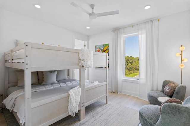 bedroom featuring recessed lighting, baseboards, a ceiling fan, and wood finished floors