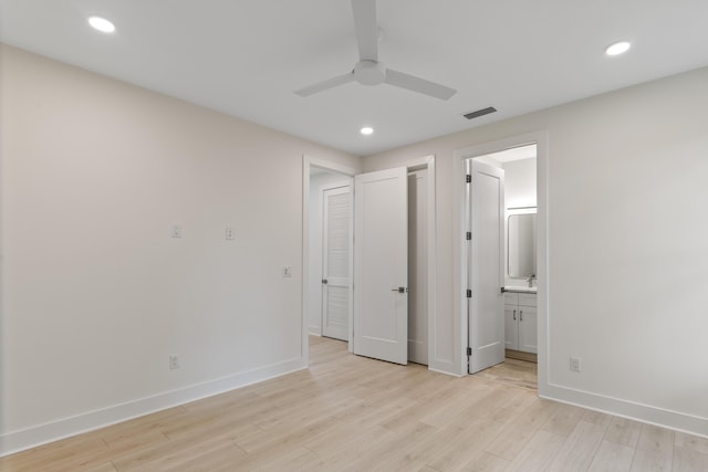 unfurnished bedroom with recessed lighting, visible vents, baseboards, and light wood finished floors