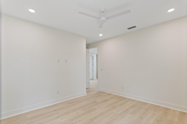 unfurnished room featuring recessed lighting, visible vents, baseboards, and light wood finished floors