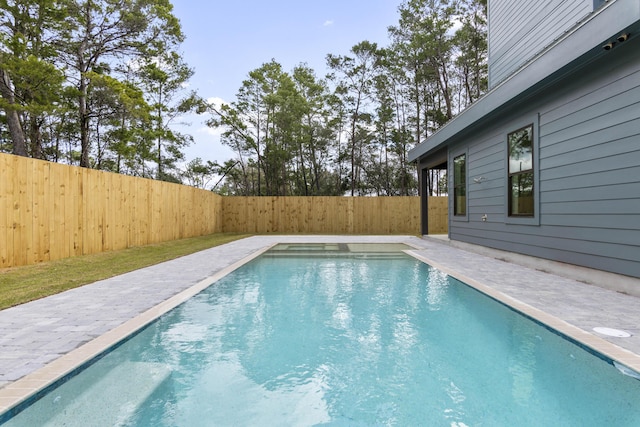 view of pool featuring a fenced backyard and a fenced in pool