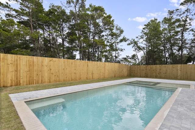 view of pool featuring a fenced in pool and a fenced backyard