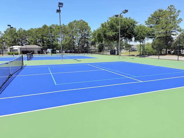 view of sport court with fence and community basketball court