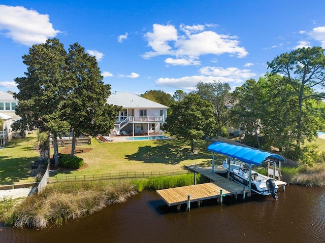 4077 N Indian Byu, Destin, FL 32541 - dock area with boat lift, a water view, and stairway