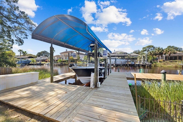 4077 N Indian Byu, Destin, FL 32541 - dock area featuring boat lift and a water view
