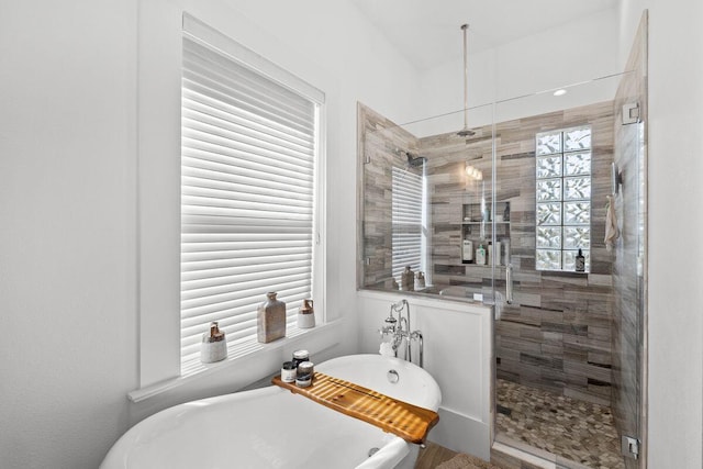 4077 N Indian Byu, Destin, FL 32541 - bathroom featuring a stall shower and a freestanding tub