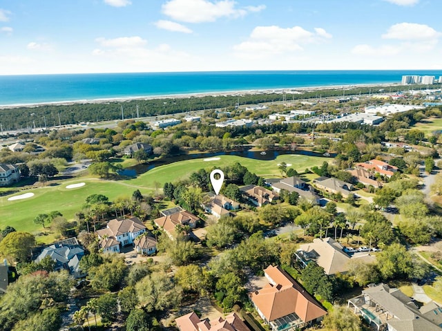 bird's eye view with a water view and golf course view