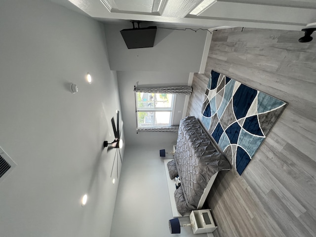 living area featuring a fireplace and wood finished floors