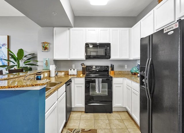 kitchen featuring black appliances, white cabinets, light tile patterned floors, and a peninsula