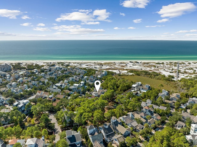 birds eye view of property featuring a residential view, a view of the beach, and a water view