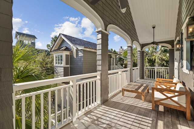 balcony featuring a ceiling fan