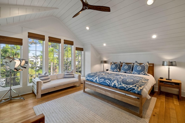 bedroom with recessed lighting, ceiling fan, lofted ceiling, and hardwood / wood-style floors