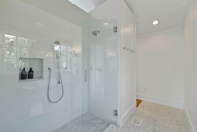 bathroom with recessed lighting, baseboards, visible vents, and a stall shower