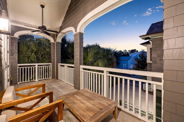 exterior space featuring a ceiling fan