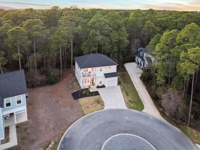 aerial view featuring a forest view