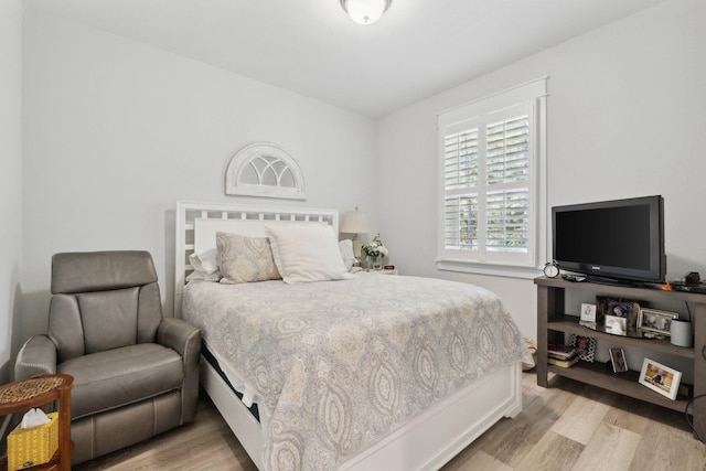 bedroom with light wood-style flooring