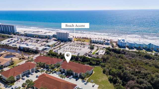 aerial view with a view of the beach and a water view