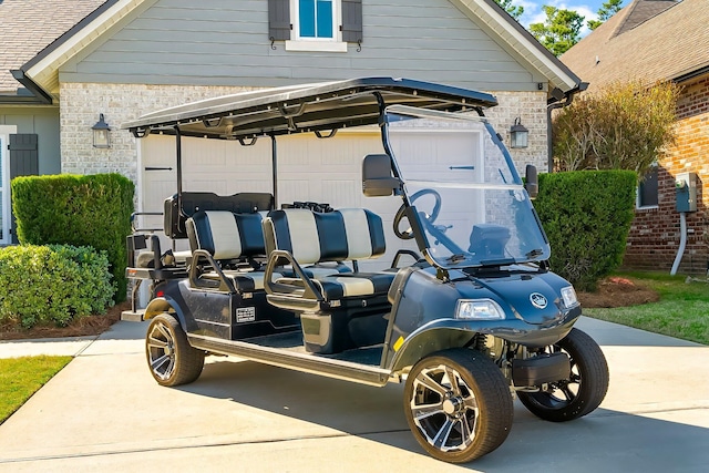 exterior space featuring a garage and driveway