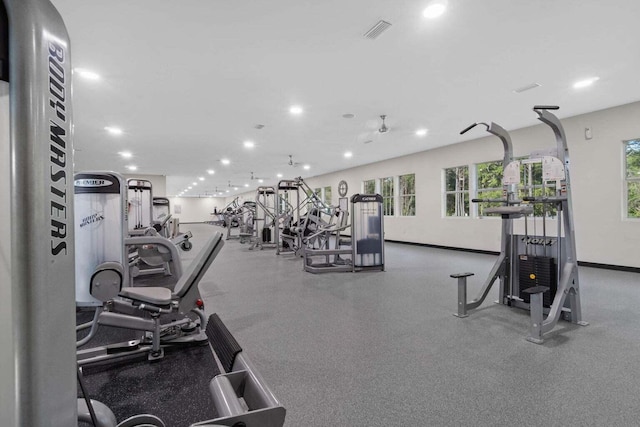 workout area with recessed lighting, visible vents, and baseboards