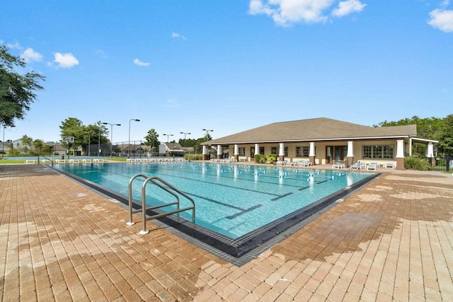 community pool featuring a patio area