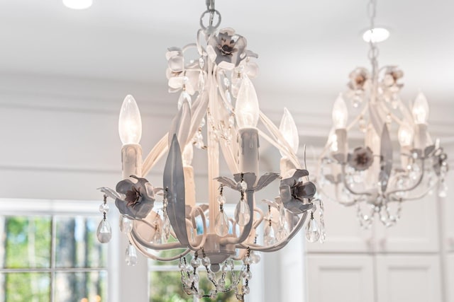 details featuring an inviting chandelier