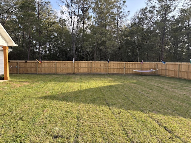 view of yard featuring a fenced backyard