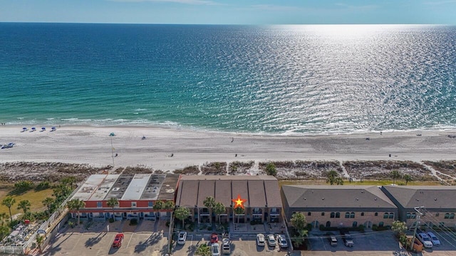 bird's eye view with a view of the beach and a water view