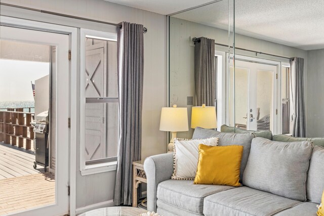 living room with a textured ceiling