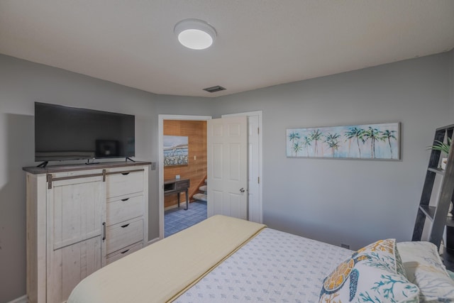 bedroom with visible vents