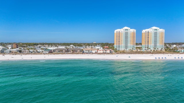 property view of water featuring a view of city and a beach view