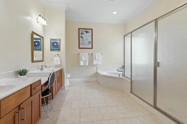 bathroom featuring tile patterned flooring, a shower stall, vanity, and ornamental molding