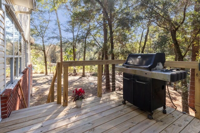 wooden deck with area for grilling