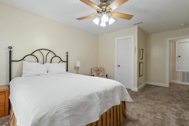 carpeted bedroom featuring visible vents, ceiling fan, and baseboards