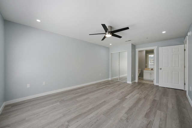 unfurnished bedroom with visible vents, baseboards, recessed lighting, a closet, and light wood-type flooring