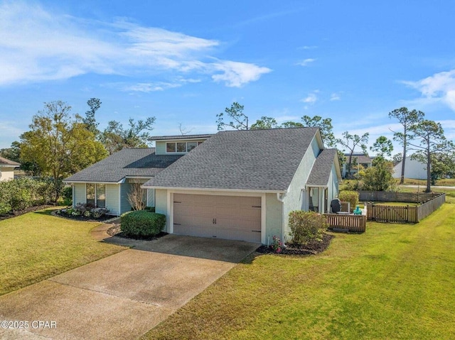 view of front of property with driveway, a shingled roof, stucco siding, a front lawn, and a garage