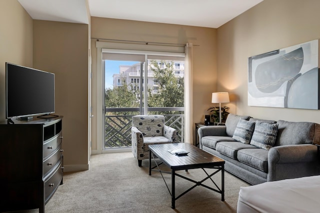 living room featuring light carpet