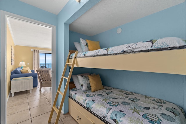 bedroom with light tile patterned flooring