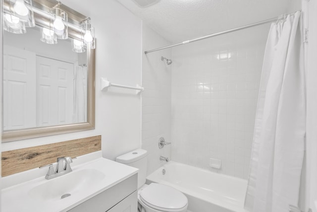 full bath with shower / bathtub combination with curtain, toilet, vanity, and a textured ceiling