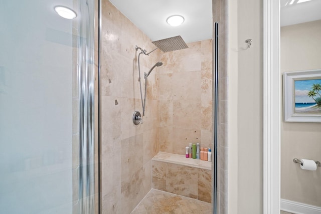 full bathroom with a shower stall