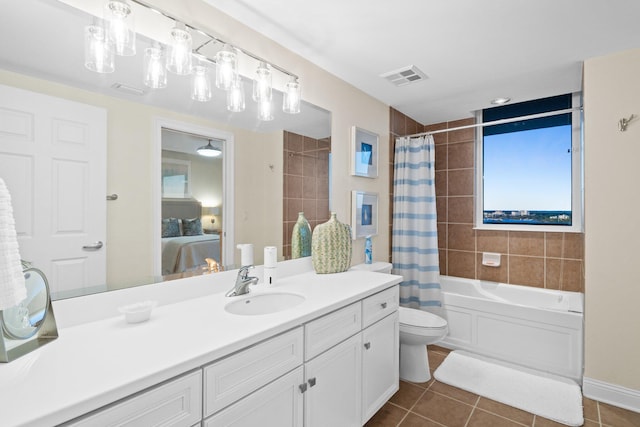 ensuite bathroom featuring visible vents, shower / tub combo with curtain, ensuite bathroom, and tile patterned flooring