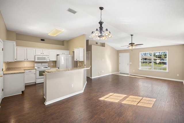 kitchen featuring visible vents, open floor plan, white cabinetry, white appliances, and dark wood-style flooring