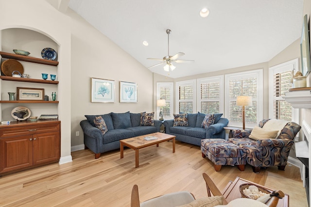 living room featuring light wood-style floors, lofted ceiling, and a ceiling fan