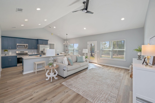 living room with visible vents, lofted ceiling, light wood-style flooring, recessed lighting, and ceiling fan with notable chandelier